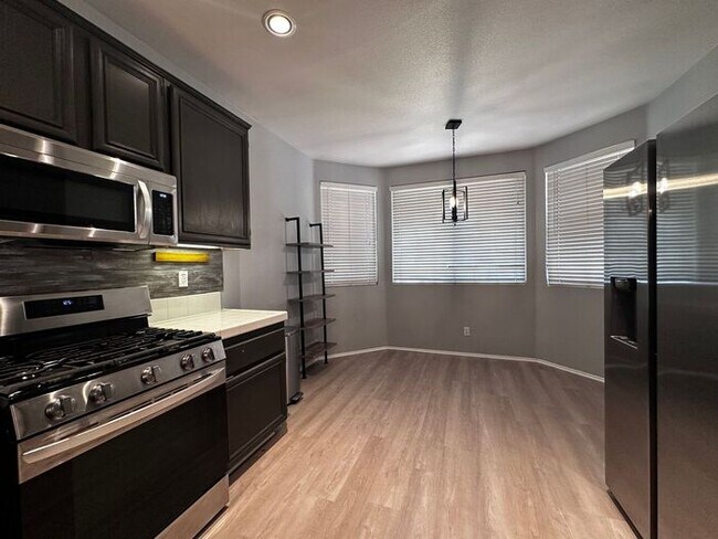 Building Photo - Welcome to your perfect blend of comfort a...