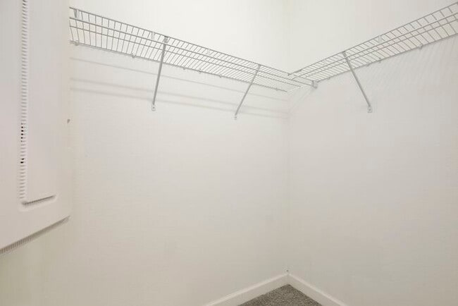 Building Photo - Beautiful 4/3.5 Townhome with a Spacious 2 Car Garage Located in Trails at Moss Park - Orlando