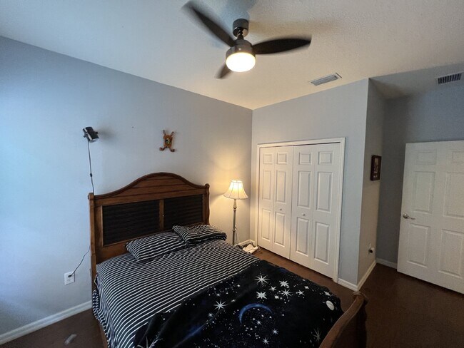 Building Photo - "Spacious 4-Bedroom Lutz Home with Elegant...