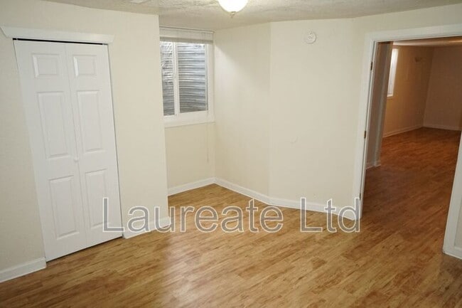 Building Photo - 6062 E 62nd Ave