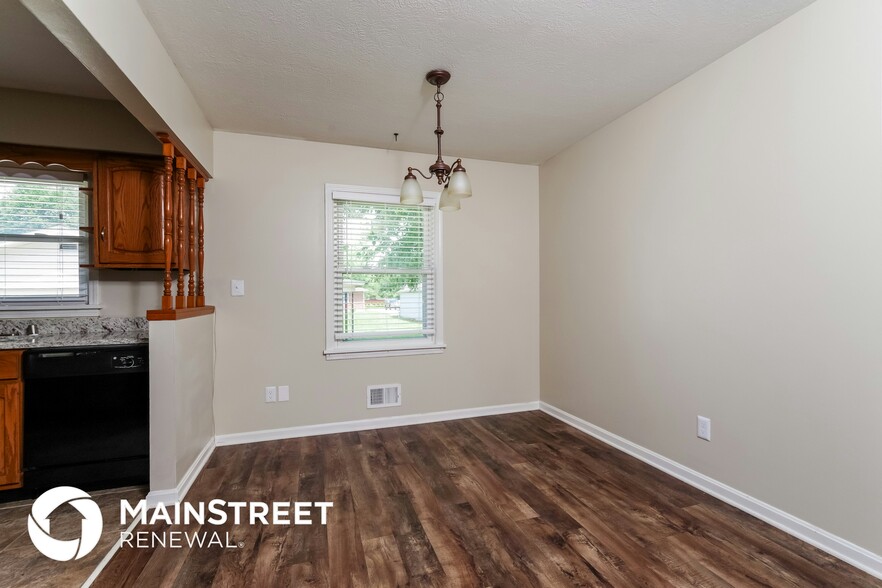 Building Photo - 8003 Canna Dr