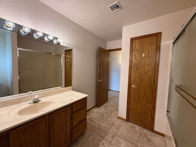 Building Photo - Available now - Unfurnished - Long Term