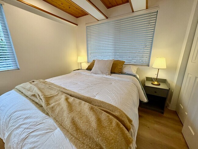 Main bedroom with all-new linens, blankets and pillows - 21204 3rd Ave S