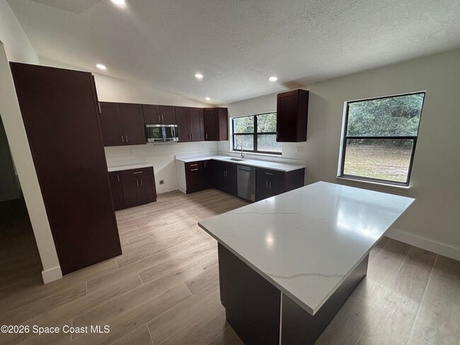 Building Photo - 6335 S Tropical Trail