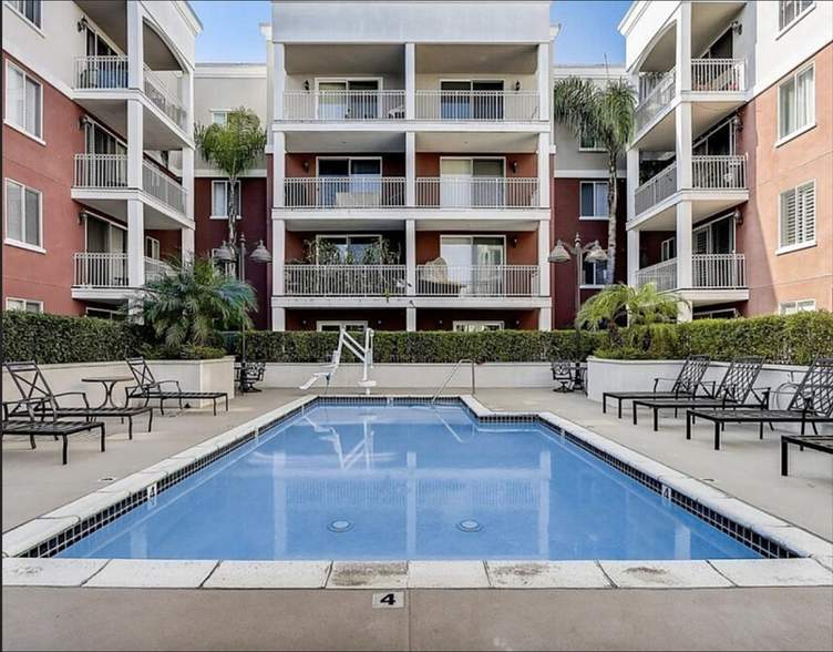 Resort-style pool for swimming and lounging - 3740 Santa Rosalia Dr