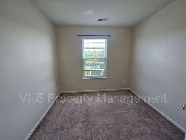 Building Photo - 6186 Library Ln