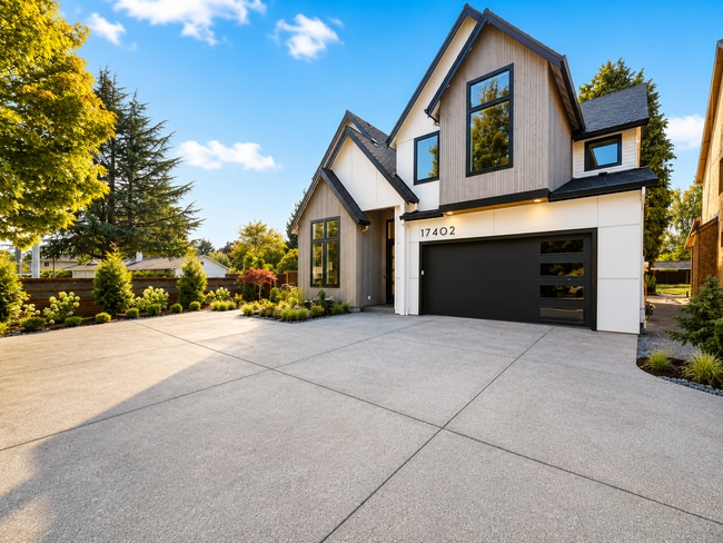 Building Photo - Brand-New 5-Bedroom Home with Main-Level Suite, Gourmet Kitchen, Luxury Finishes & Covered Patio