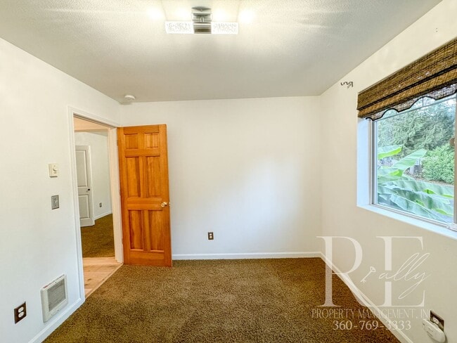 Building Photo - Single Story, Tranquil Gardens, 3-Car Garage!