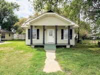 Building Photo - Move-In Ready in Sulphur | Updated 2BR Home w/ Covered Front Porch + Granite Countertops