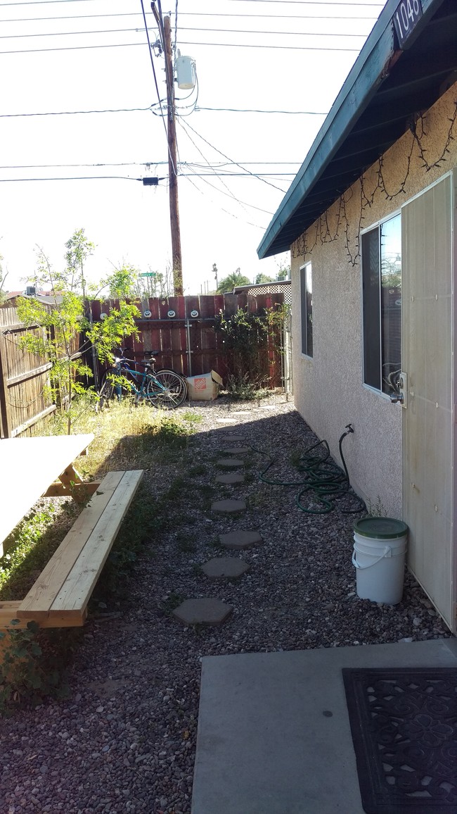 side yard - 1048 E Lester St