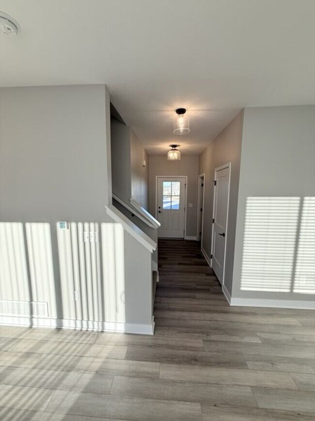 Building Photo - Spacious 4-Bedroom Home with 2-Car Garage & Yard