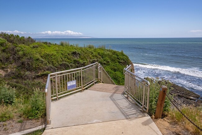 Building Photo - This Sunset Beach Estates Townhome will have you speechless!