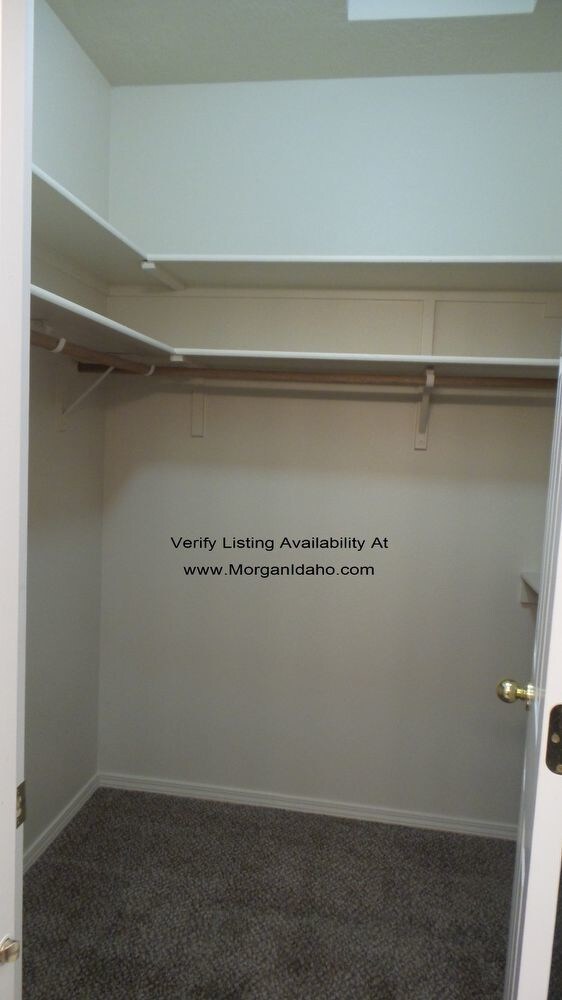 Building Photo - 2-car garage, mowing included, convenientl...