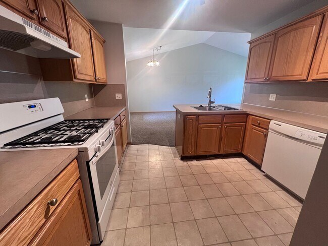 Building Photo - Spacious Duplex in Walker! Two Stall Garage!