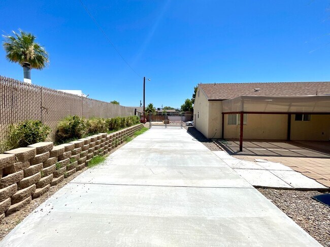 Building Photo - Inviting 3 Bedroom Home with RV Parking an...