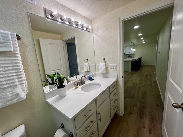 Bathroom sink & vanity with large mirror - 28011 E Otero Pl
