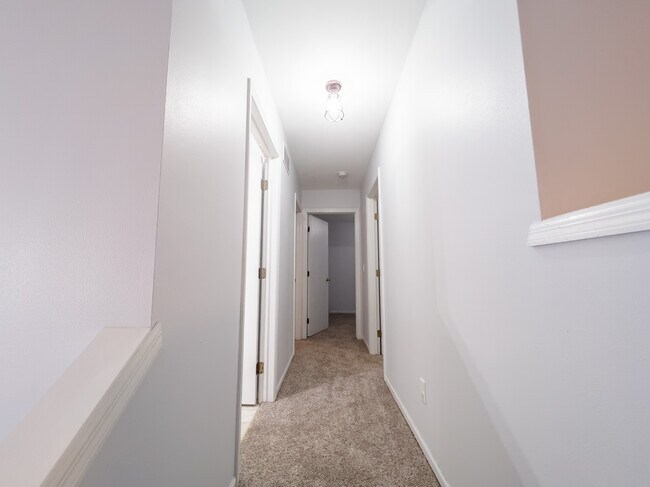Upstairs hallway to bedrooms/bathroom - 605 Ruxton Ridge Dr