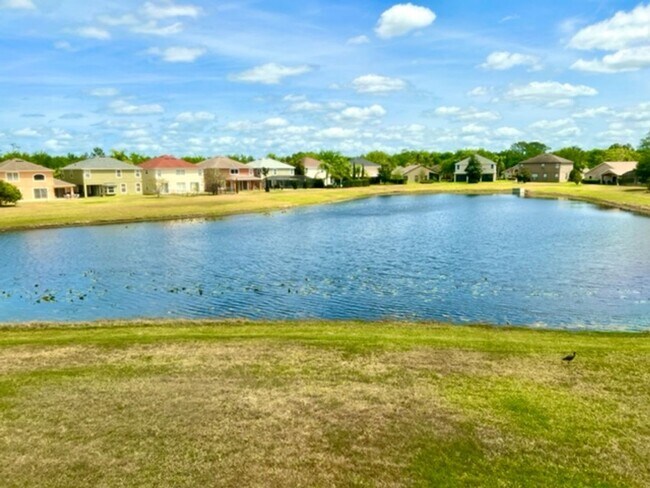Building Photo - EAGLE CREEK LAKE NONA! WELCOME HOME! Beautiful water views! Spacious 2 story-3 bedroom 2.5 bath h...