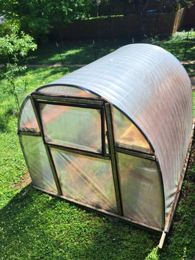 Building Photo - Cute white cottage with white picket fence & Huge deck off back door!