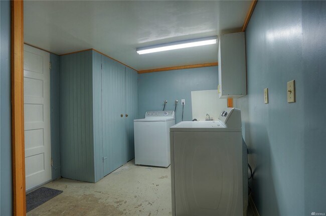 Laundry room with a washer and dryer located in Basement: Shared - 1215 N Anderson St