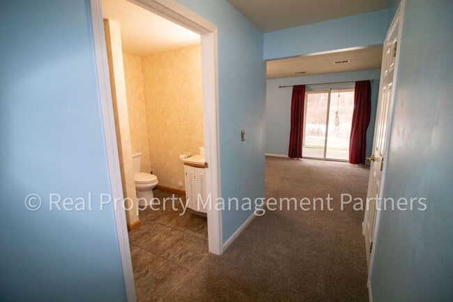 Building Photo - Forest Hills 3 Bed Townhome with Garage, Pond View and Some Utilities Included