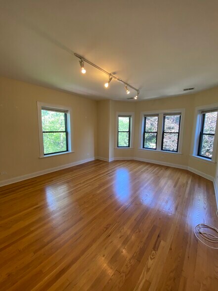 Large bright open living room - 4056 N Harding Ave