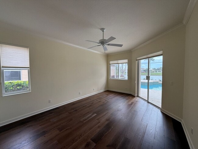 Building Photo - Luxurious 4 Bedroom 3 Bath Lakefront Pool Home W/3-Car Garage