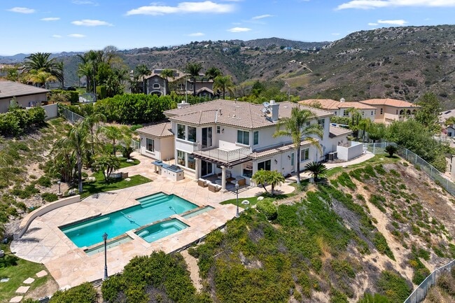 Building Photo - A Private Hillside Haven with Sweeping Val...