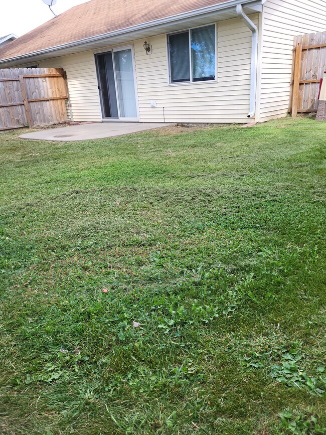 Fenced in back yard and patio - 600 Crestview Dr