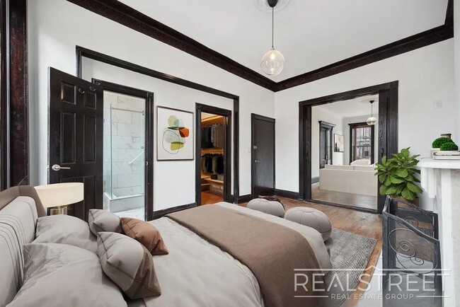 Building Photo - Timelessly Renovated Historic Triplex with...