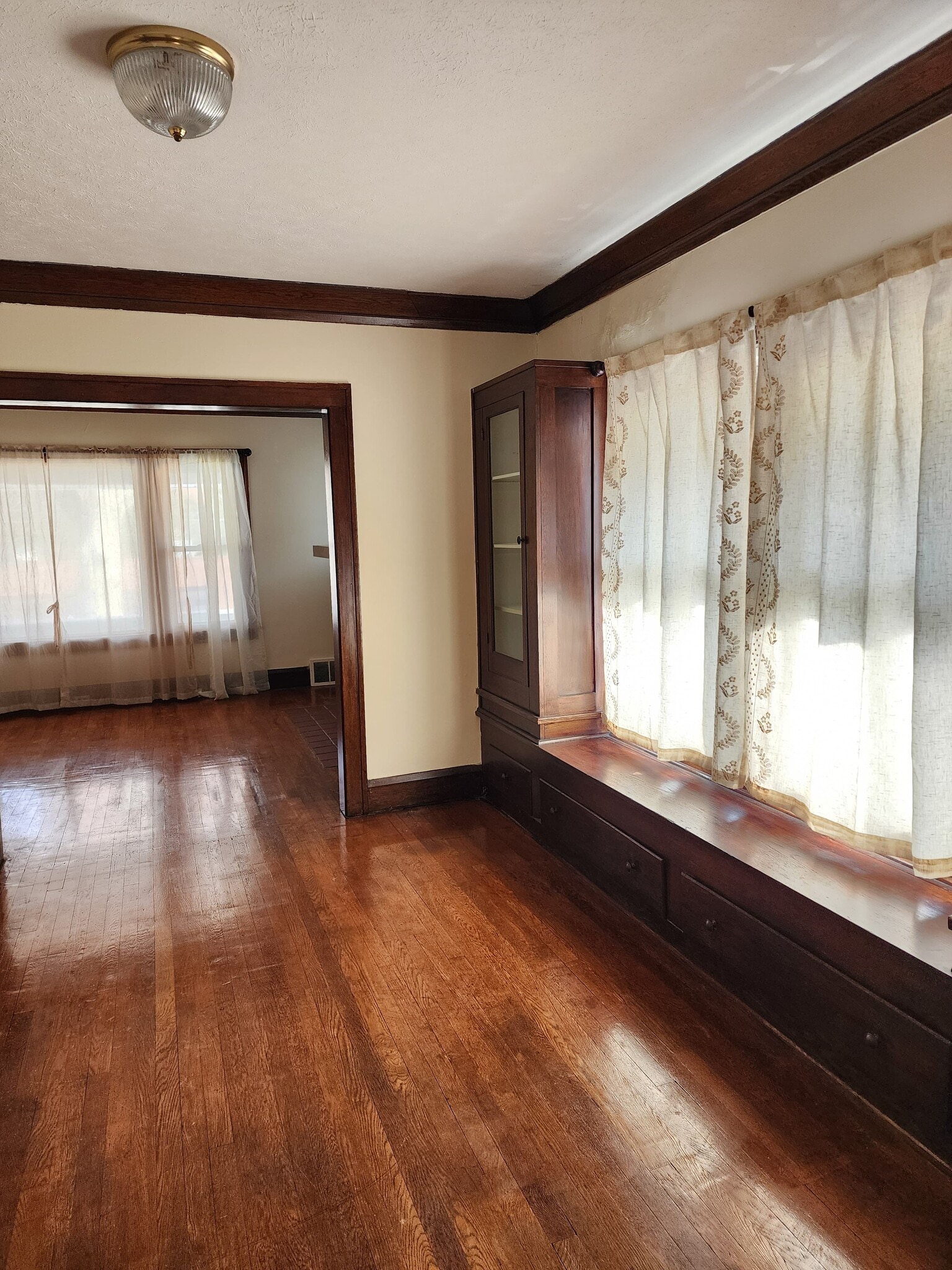 Spacious Dining Room with Hardwood floor and built-in cabinets. Curtains included - 1382 Webb Rd