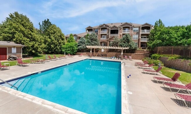 Building Photo - Bright 2-Bedroom Condo with Private Patio & Resort-Style Amenities!