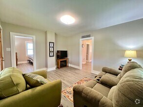 Building Photo - This adorable fully furnished 2 bedroom/1 ...