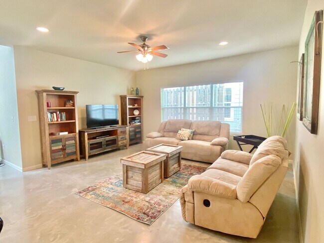 Building Photo - This charming two-story home, built in 2018, offers a spacious open floor plan perfect for casual...