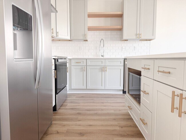 Building Photo - Luxury 3-Bedroom Townhome with Flex Room at Highbury + Summer Special