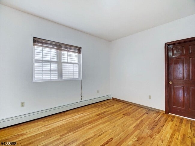 Building Photo - 921 Paterson Plank Rd
