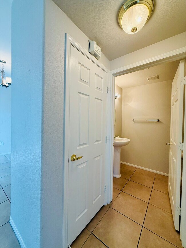 Building Photo - Immaculate and Inviting Two-Story Condo in Lone Mountain Available! 1/2 OFF THE FIRST FULL MONTH'...