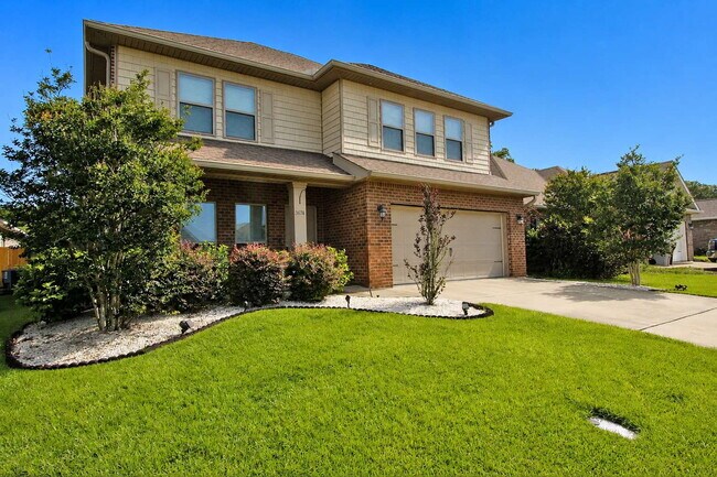 Building Photo - Spacious Pace Home Featuring 4 Bedrooms, 3.5 Baths, Two Living Areas & First-Floor Primary Suite ...