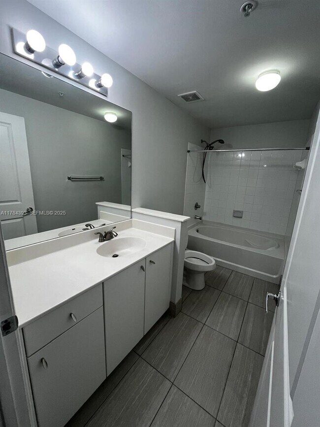 Building Photo - 5900 W Sample Rd