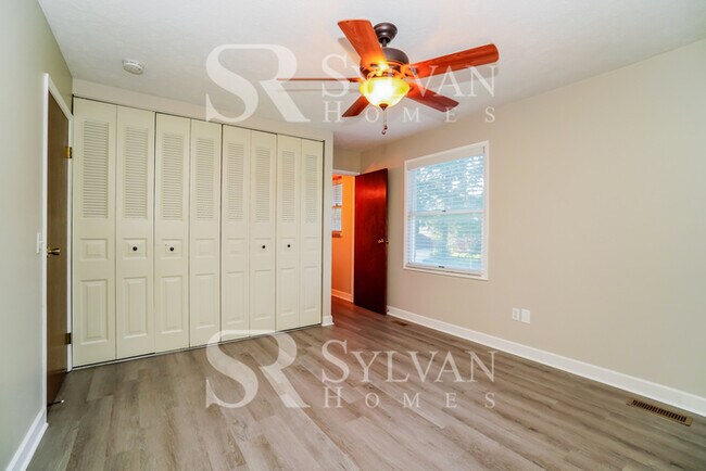 Building Photo - The living is easy in this 3 bedroom, 2.5 bathroom home