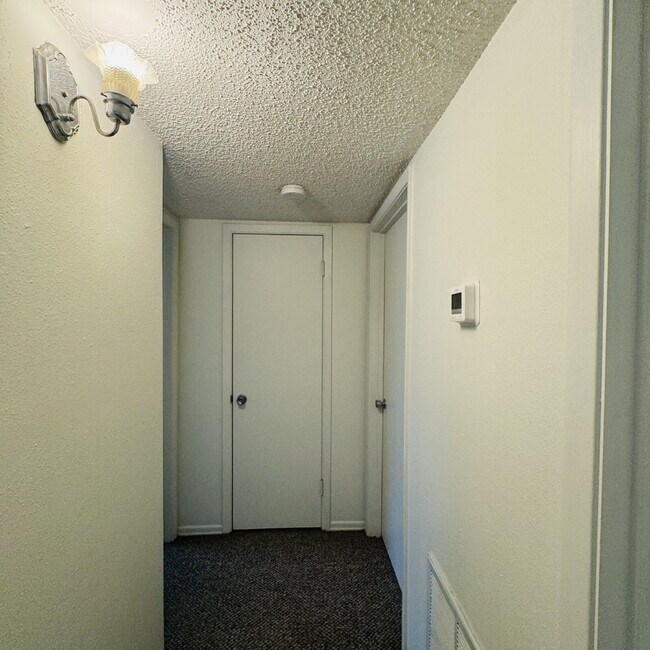 Building Photo - Inviting Townhome at Maison Helena Townhomes in Nederland, TX