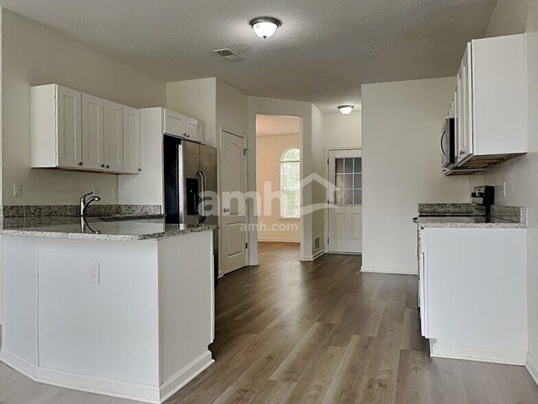 Building Photo - 7138 Arcastle Loop E