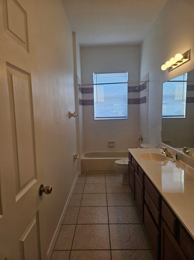 Building Photo - 4 BEDROOM 3 FULL BATH HOME WITH A SCREENED IN POOL IN THE BEAUTIFUL PALM COAST
