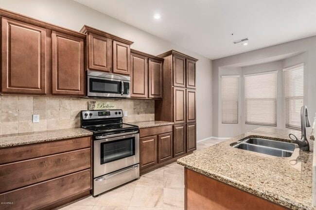 Building Photo - 9268 E Aster Dr