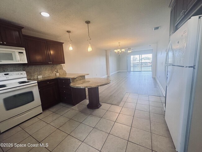 Building Photo - 325 S Banana River Blvd