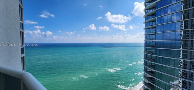 Building Photo - 15811 Collins Ave
