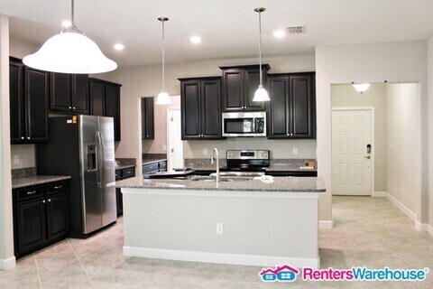 Building Photo - Gorgeous 4 bed Home in Enclave Boyette 1st...