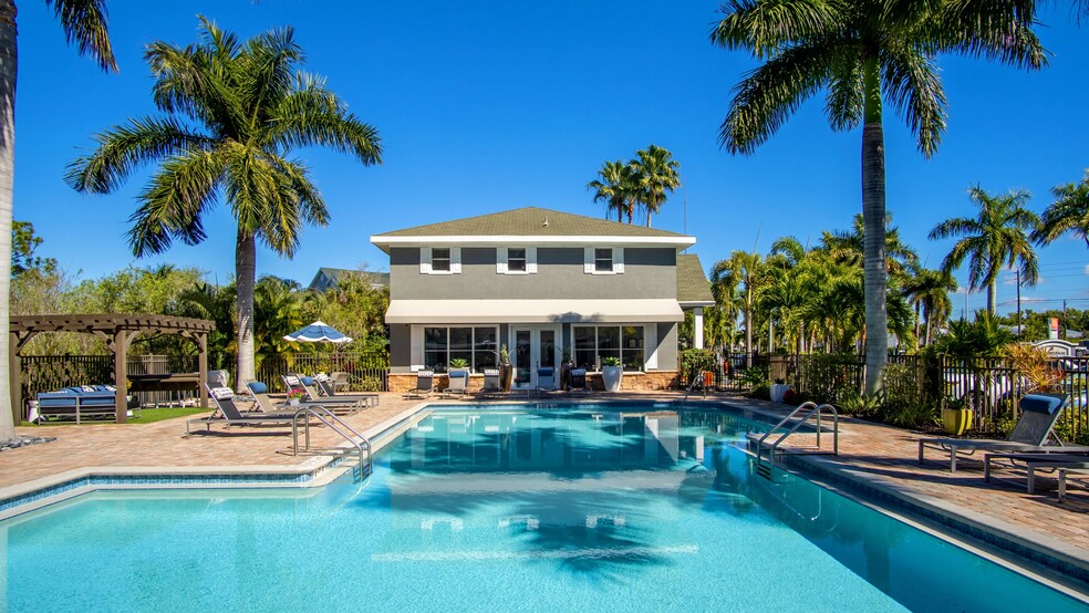 Reinvigorate yourself in our refreshing pool, surrounded by our expansive sundeck. - Somerset Palms