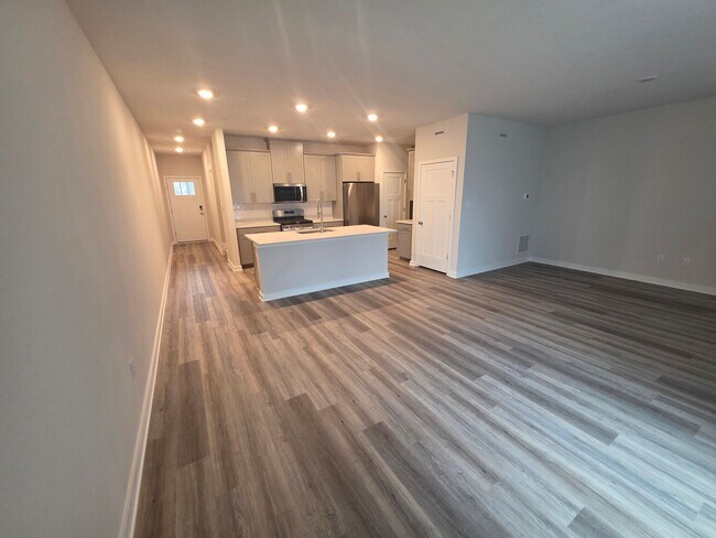 Building Photo - Luxury 4-Bedroom Townhome with Finished Walkout Basement & River Views