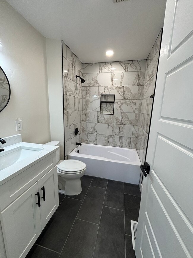 Building Photo - Beautifully Renovated 4-Bedroom Home with Finished Basement